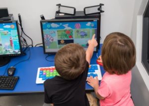 Brighton Preschool Students Learning on Computer at Higgins Campus and enjoying Enrichment Activities