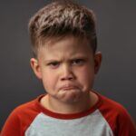 brighton preschool-blog image- preschool boy frowning experiencing emotional development