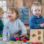 children playing and experiencing emotional development